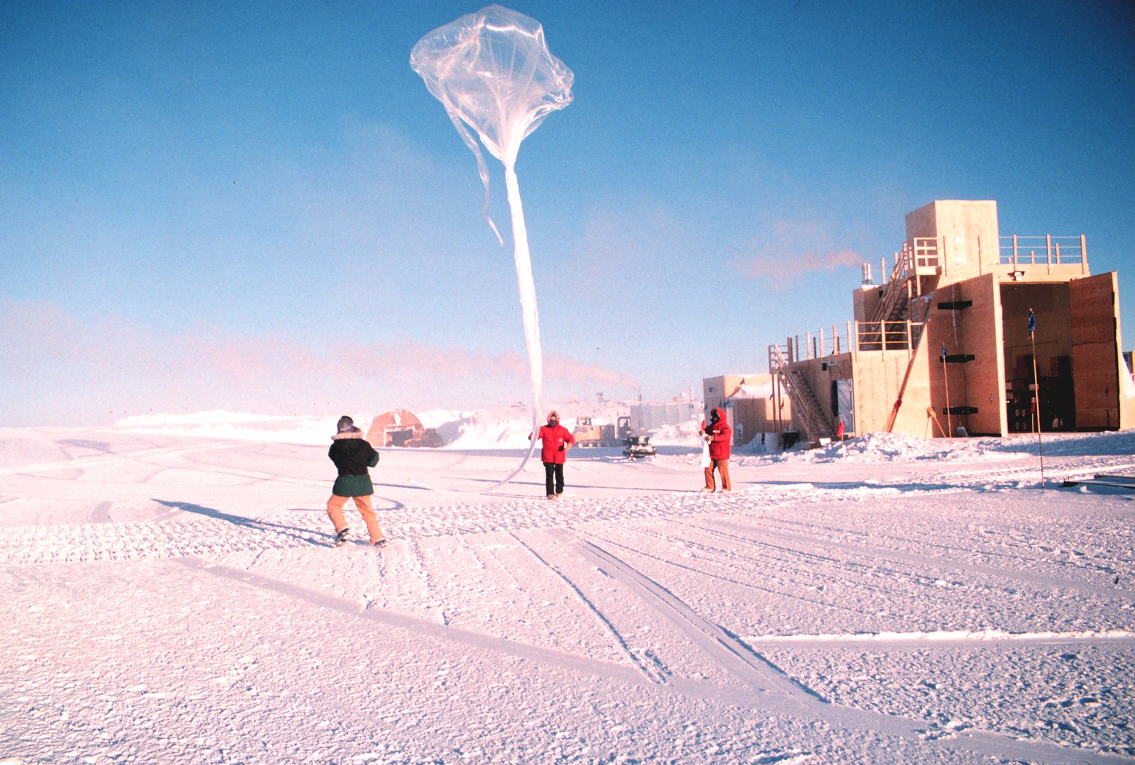 Launching an ozonesonde attached to balloon to assess the ozone layer in the South Pole. 