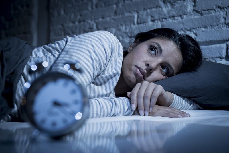 Woman awake at 3am in the morning 